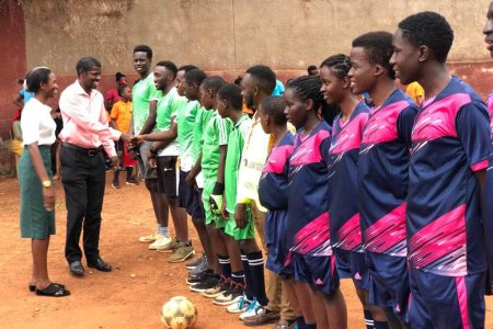 Director and Principal shake hands with players during shoma tournament